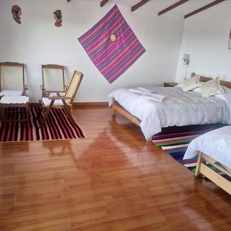 Hostal Inca Uma Comunidad Yumani Bagian luar foto