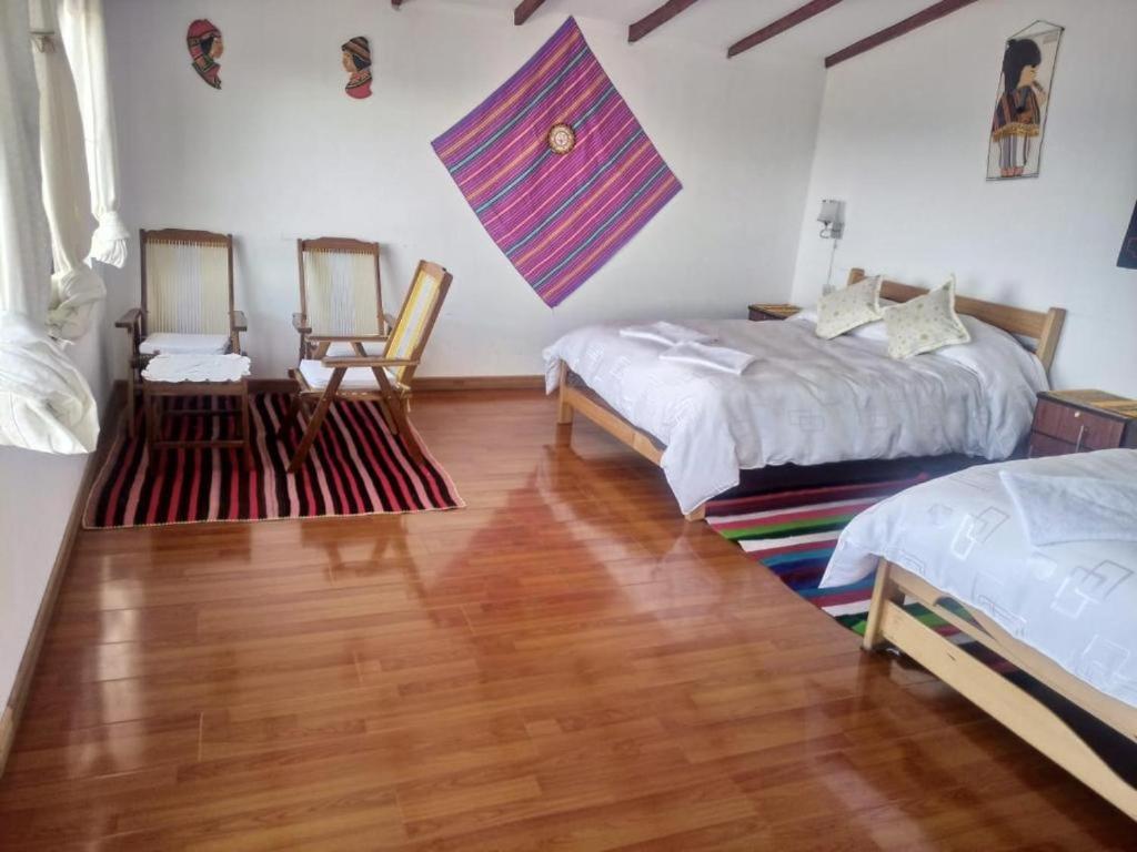 Hostal Inca Uma Comunidad Yumani Bagian luar foto