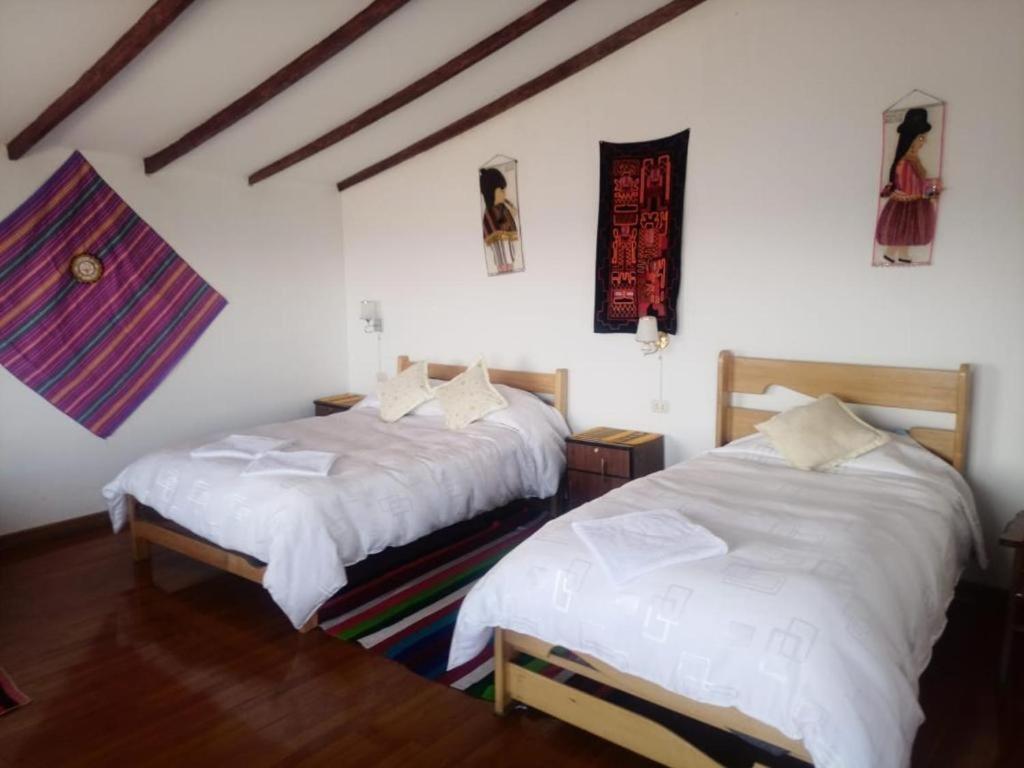 Hostal Inca Uma Comunidad Yumani Bagian luar foto