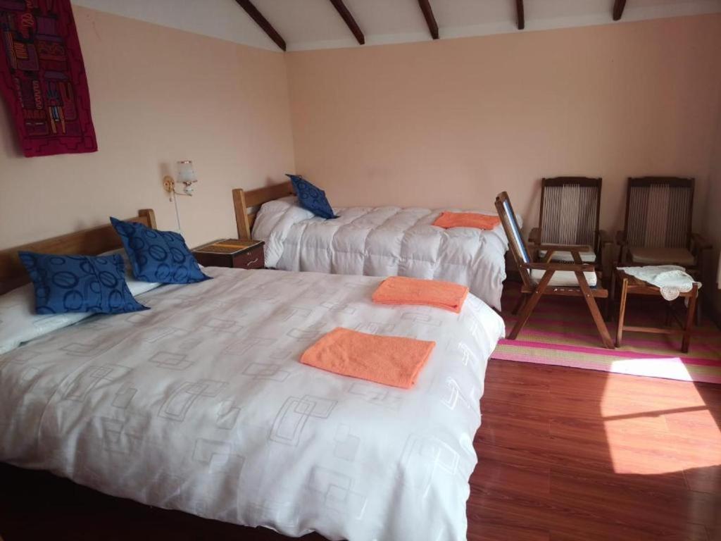 Hostal Inca Uma Comunidad Yumani Bagian luar foto