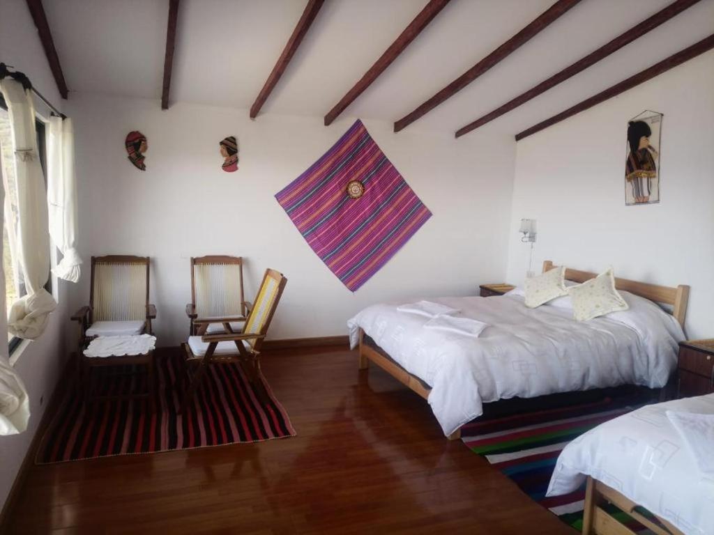 Hostal Inca Uma Comunidad Yumani Bagian luar foto