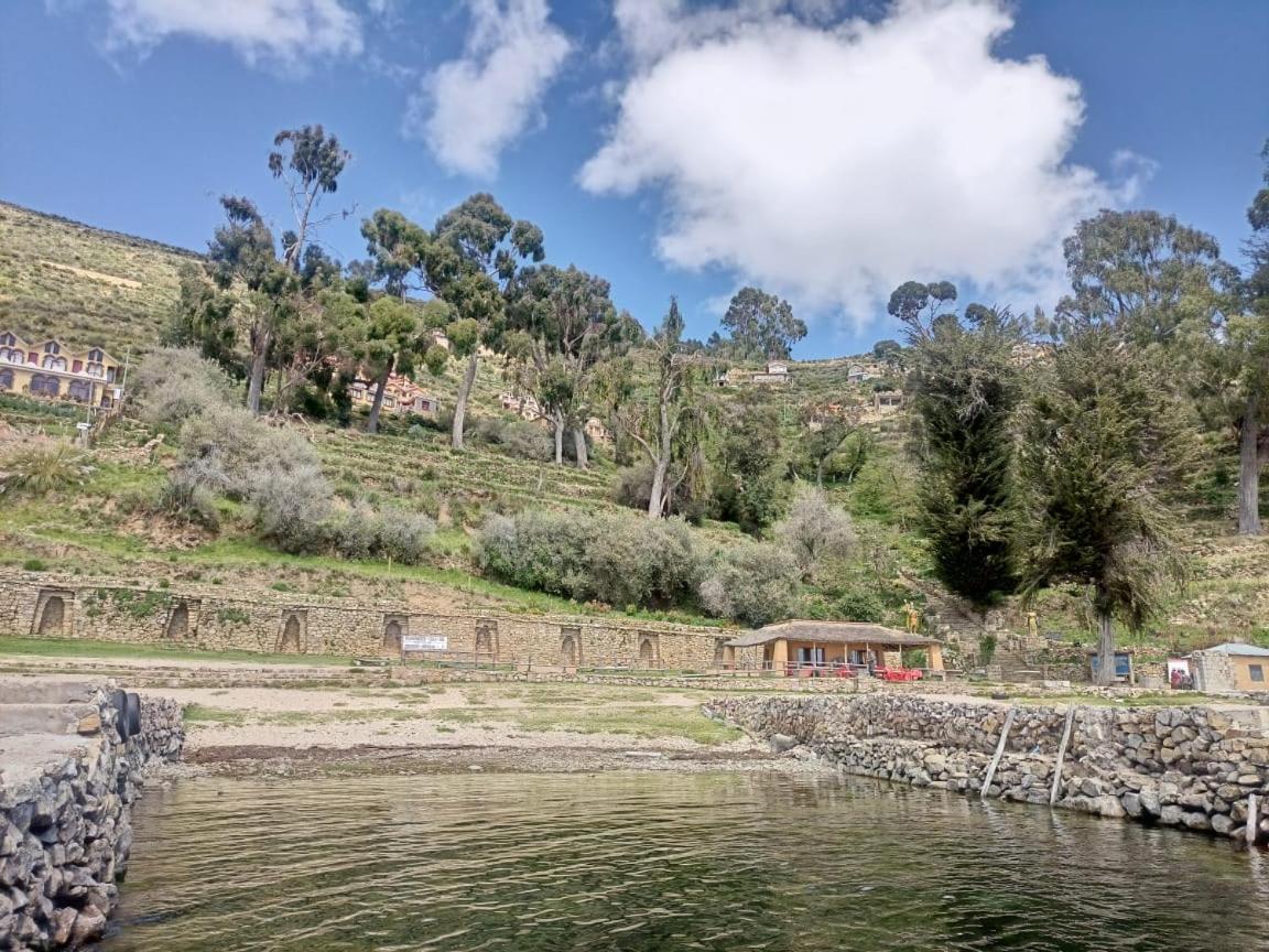 Hostal Inca Uma Comunidad Yumani Bagian luar foto