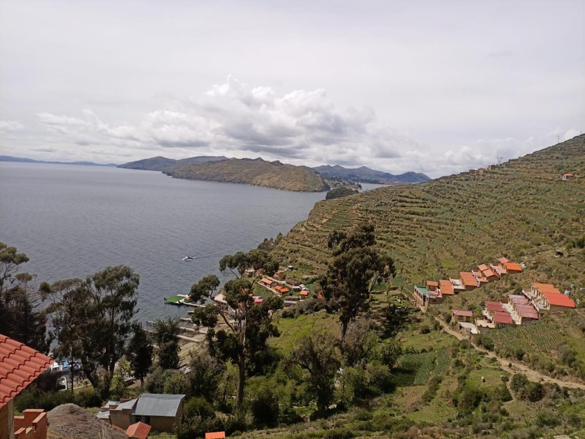 Hostal Inca Uma Comunidad Yumani Bagian luar foto