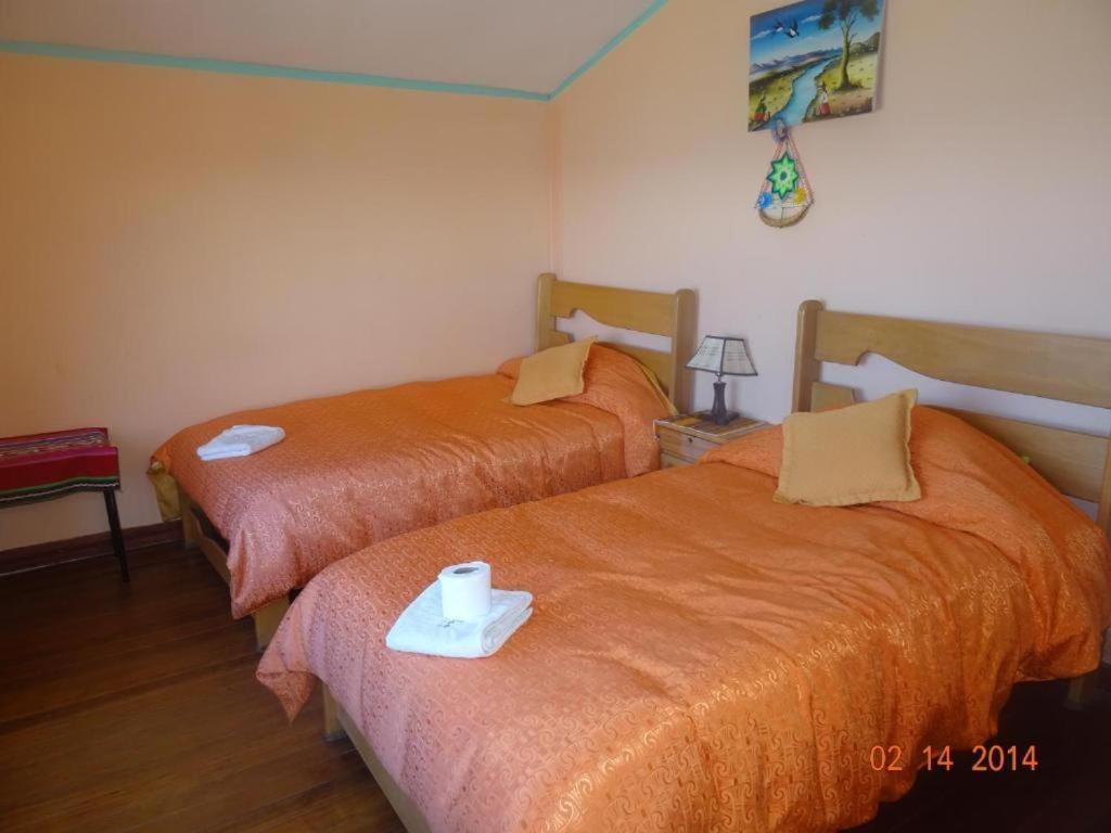Hostal Inca Uma Comunidad Yumani Bagian luar foto