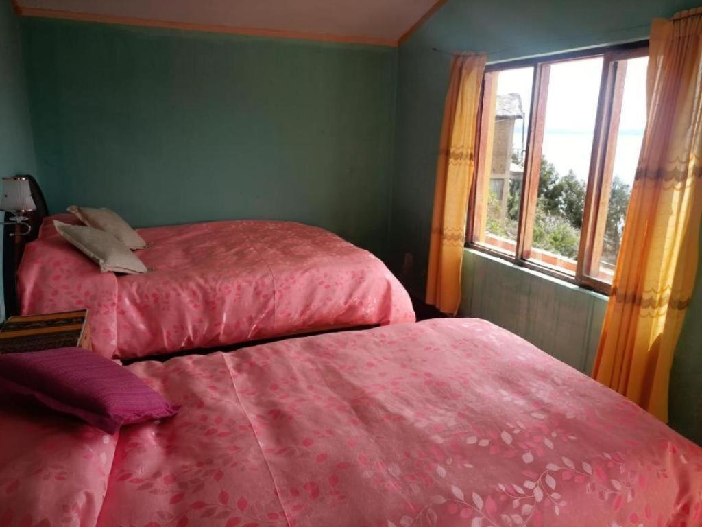 Hostal Inca Uma Comunidad Yumani Bagian luar foto