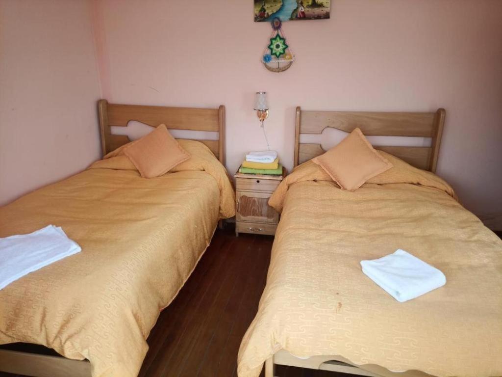 Hostal Inca Uma Comunidad Yumani Bagian luar foto
